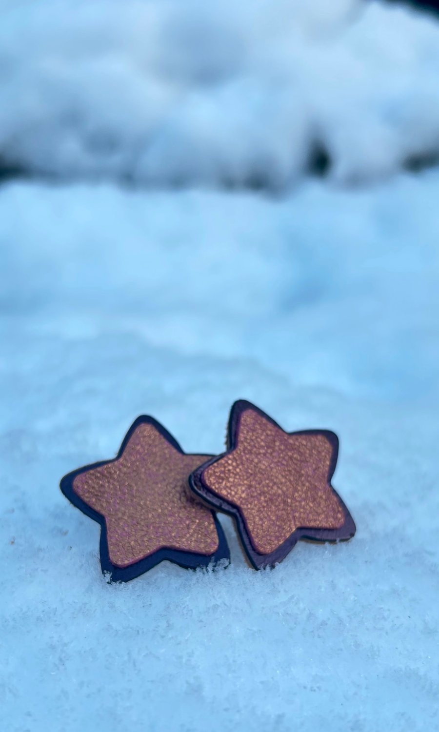 Leather star earrings in purple and pink metallic