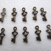mini bronze key charms
