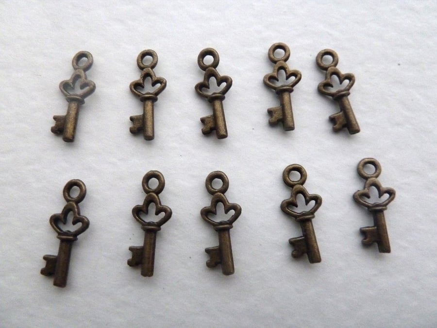 mini bronze key charms