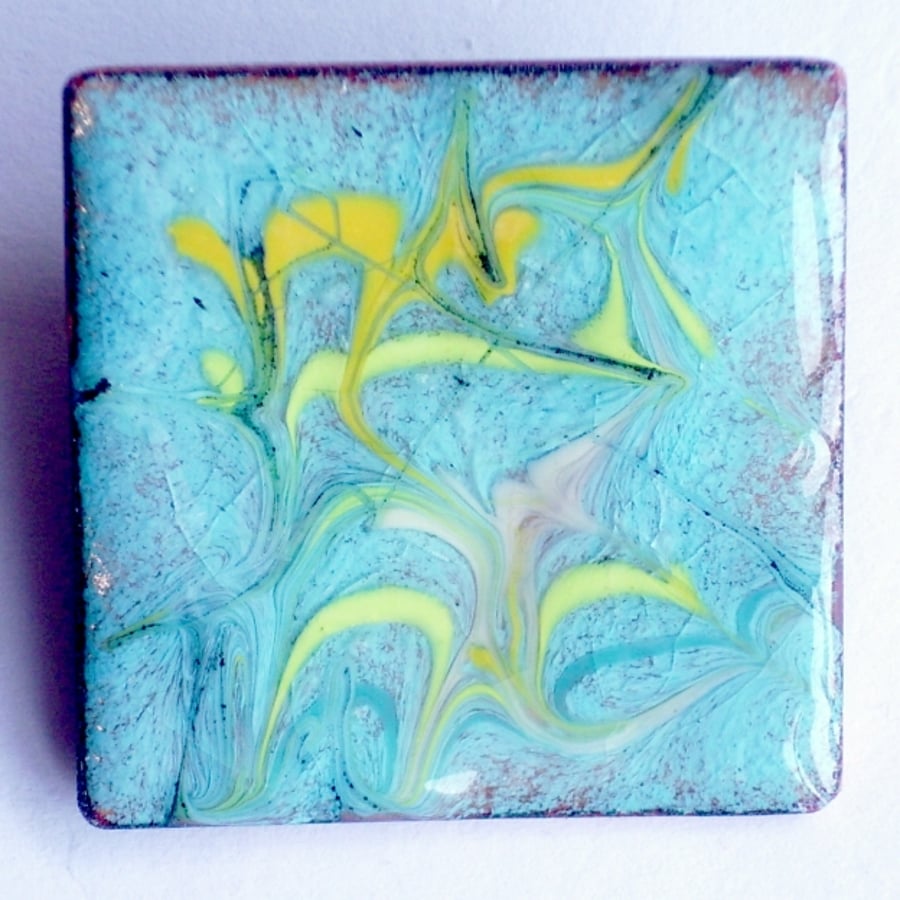 brooch - square: scrolled yellow and gold on turquoise over clear enamel