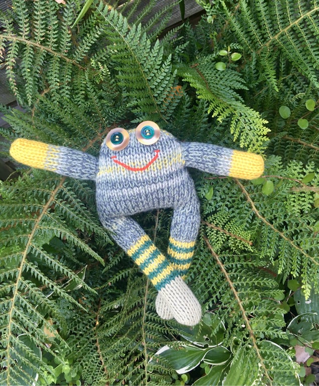Frog had knitted doll