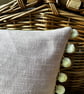Yellow floral velvet cushion cover with blush pink cotton back and pompoms - Image 5