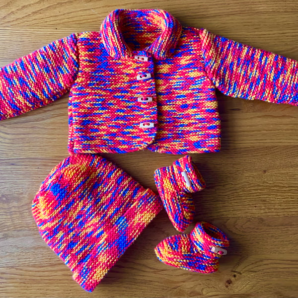 Hand Knitted Gender neutral Three Piece Pram Set in vibrant primary colours 