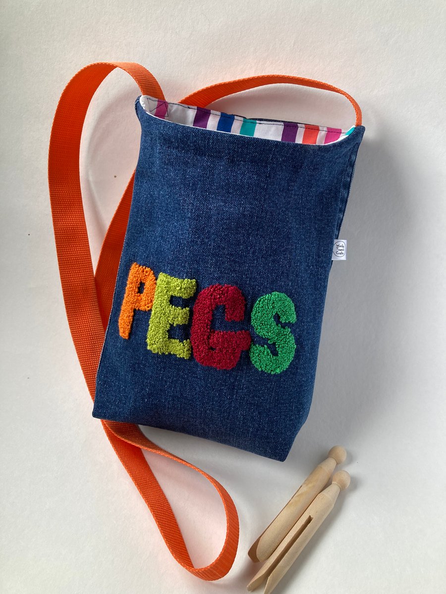 Peg bag, cross-body style. Repurposed denim with punch needle decoration