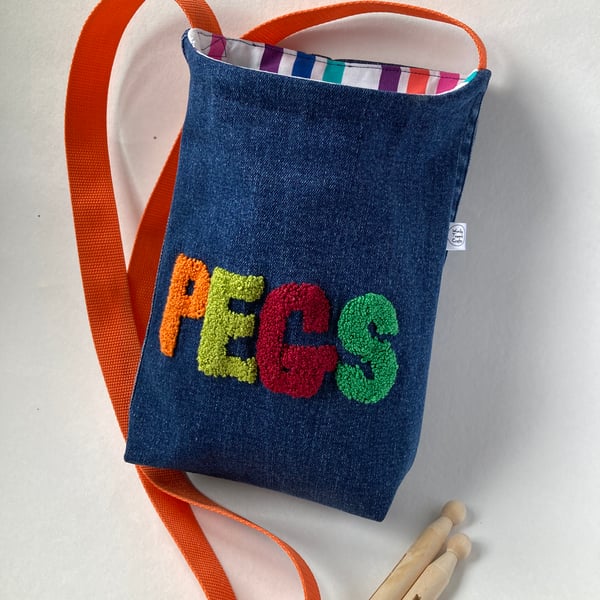 Peg bag, cross-body style. Repurposed denim with punch needle decoration
