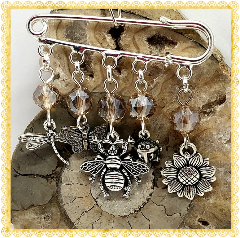 OOAK Honey Bee pin with, sunflower, ladybird and other charms 