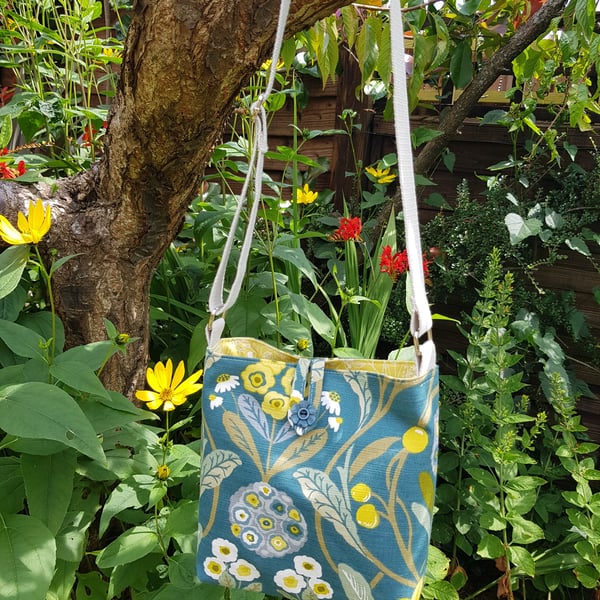 Fabric crossbody bag with adjustable strap: floral on teal