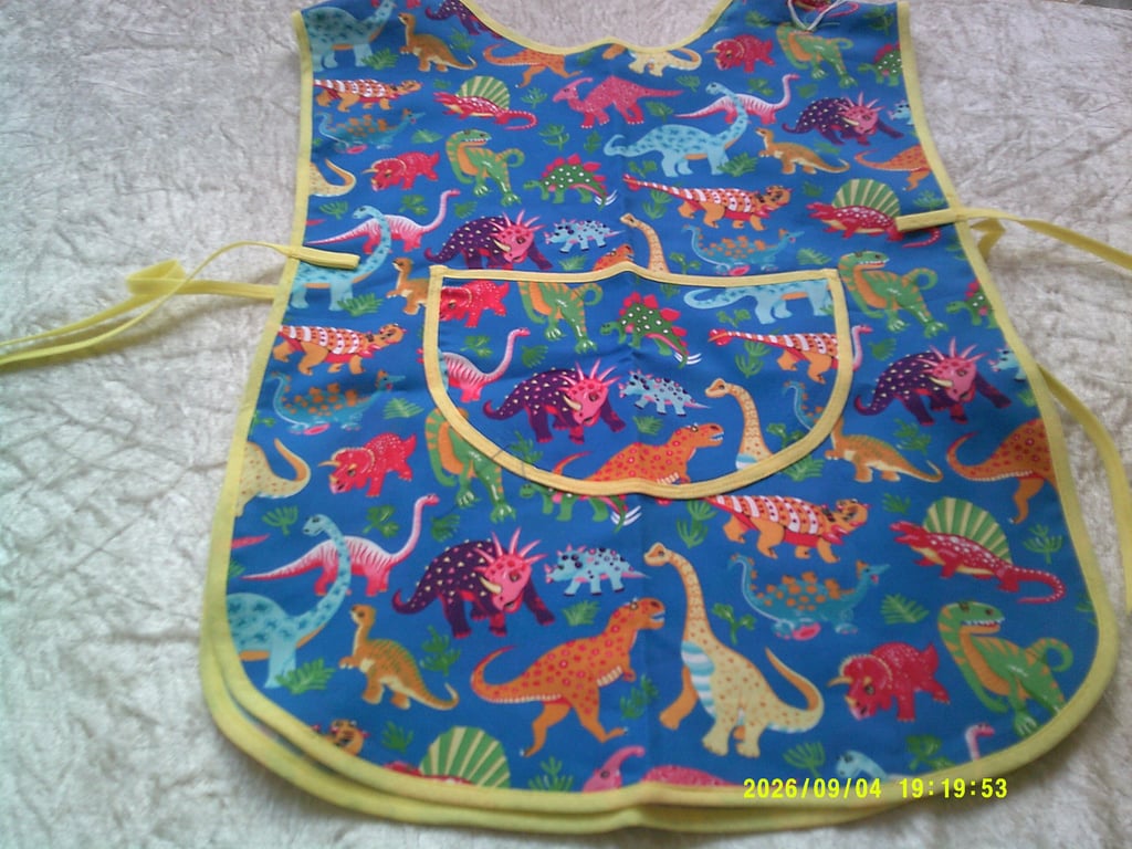 Colourful Dinosaurs on Blue Childs Tabard