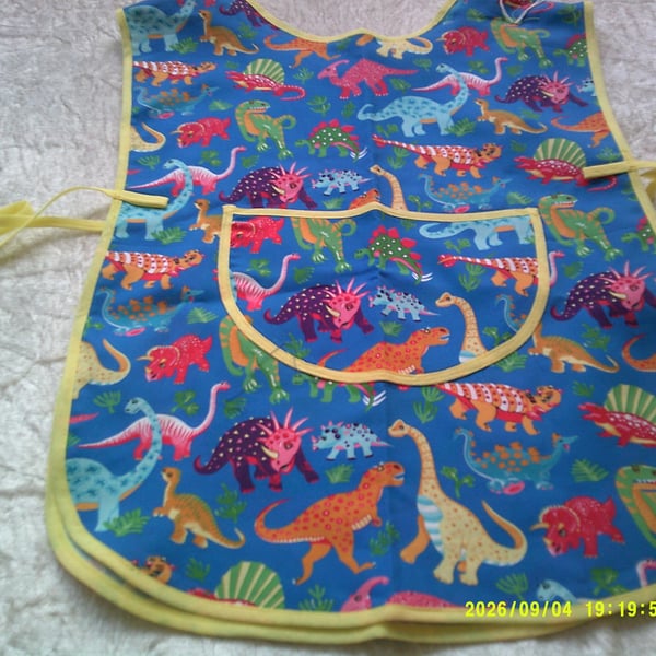 Colourful Dinosaurs on Blue Childs Tabard