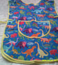 Colourful Dinosaurs on Blue Childs Tabard