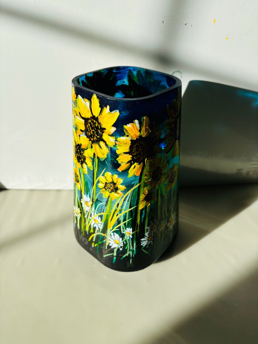 A hand painted and fired glass vase by Andrew Jenkins 