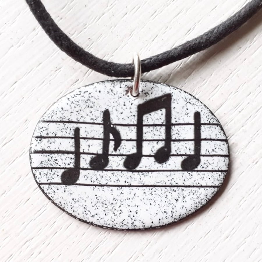 Oval Musical Notes Pendant