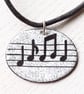 Oval Musical Notes Pendant - Image 1