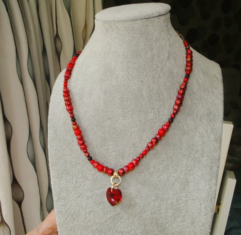 Shades of red bead necklace  with an Austrian crystal heart  Gift 
