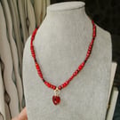 Shades of red bead necklace  with an Austrian crystal heart  Gift 