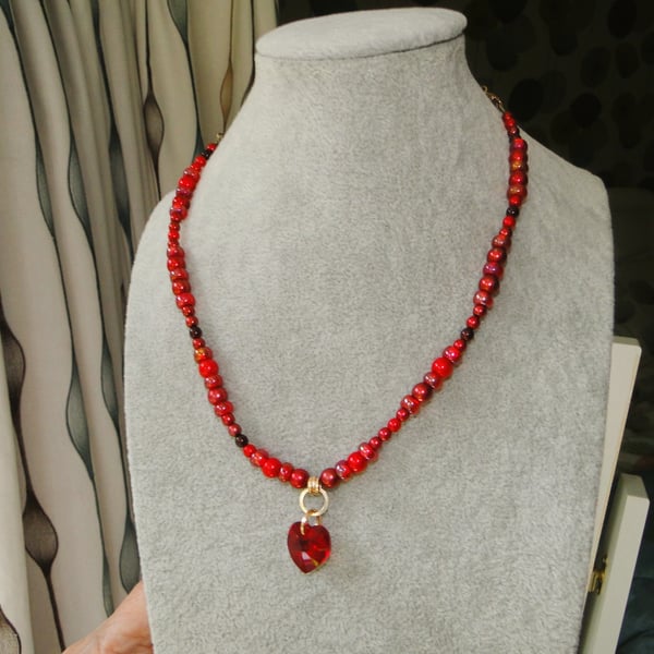Shades of red bead necklace  with an Austrian crystal heart  Gift 