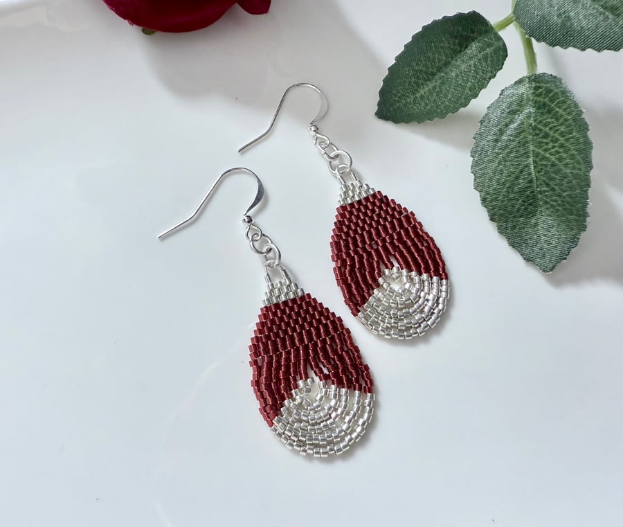 Beadwork teardrop earrings in shiny maroon red and silver