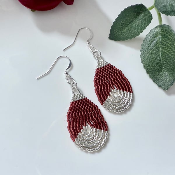 Beadwork teardrop earrings in shiny maroon red and silver