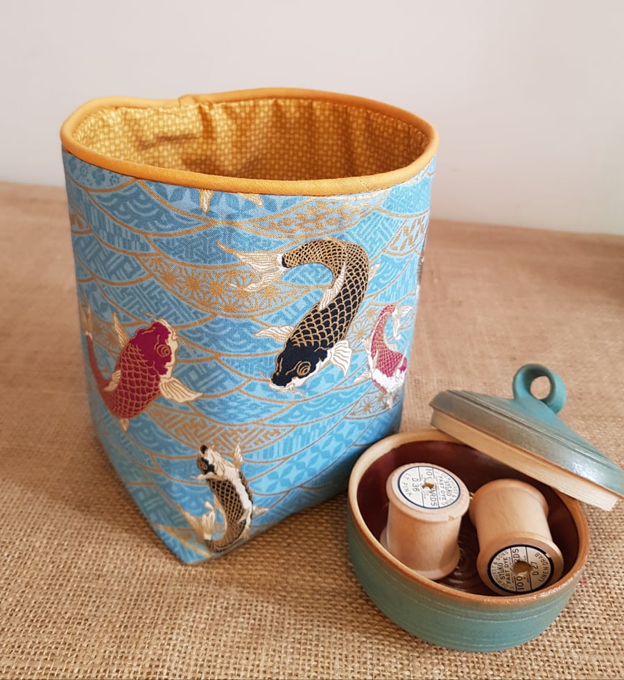Fabric storage container: golden fish on turquoise 