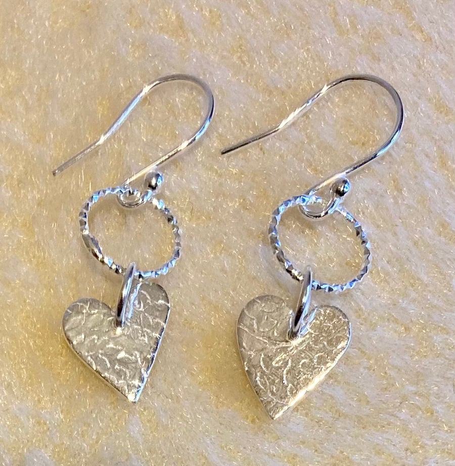 Heart shaped, pure silver earrings with delicate leaf pattern & textured hoops 