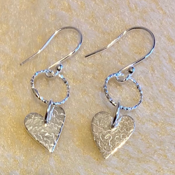 Heart shaped, pure silver earrings with delicate leaf pattern & textured hoops 