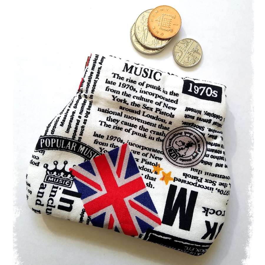 Coin purse or earbud pouch, newsprint fabric with music news from the 1970’s