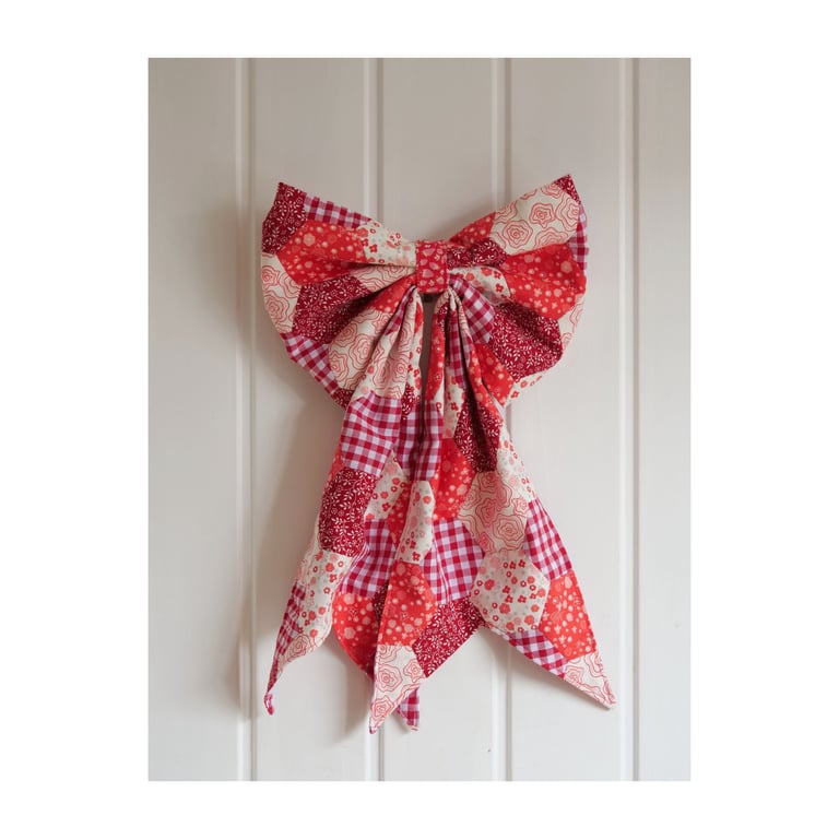 Red oversized bow, made using English Paper Piecing technique