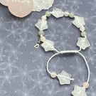 Knotted cord bracelet with clear quartz stars, rose quartz and labradorite 