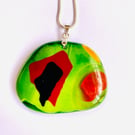 Green glass pendant on chain