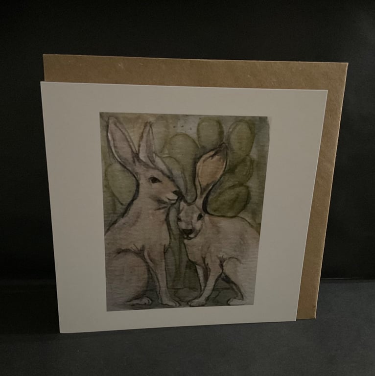 Hares in the undergrowth ,blank greeting card 