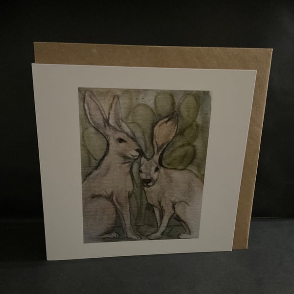 Hares in the undergrowth ,blank greeting card 