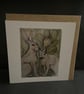 Hares in the undergrowth ,blank greeting card 