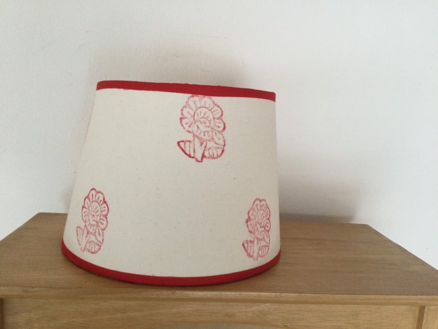 Hand printed shade with red design on natural calico