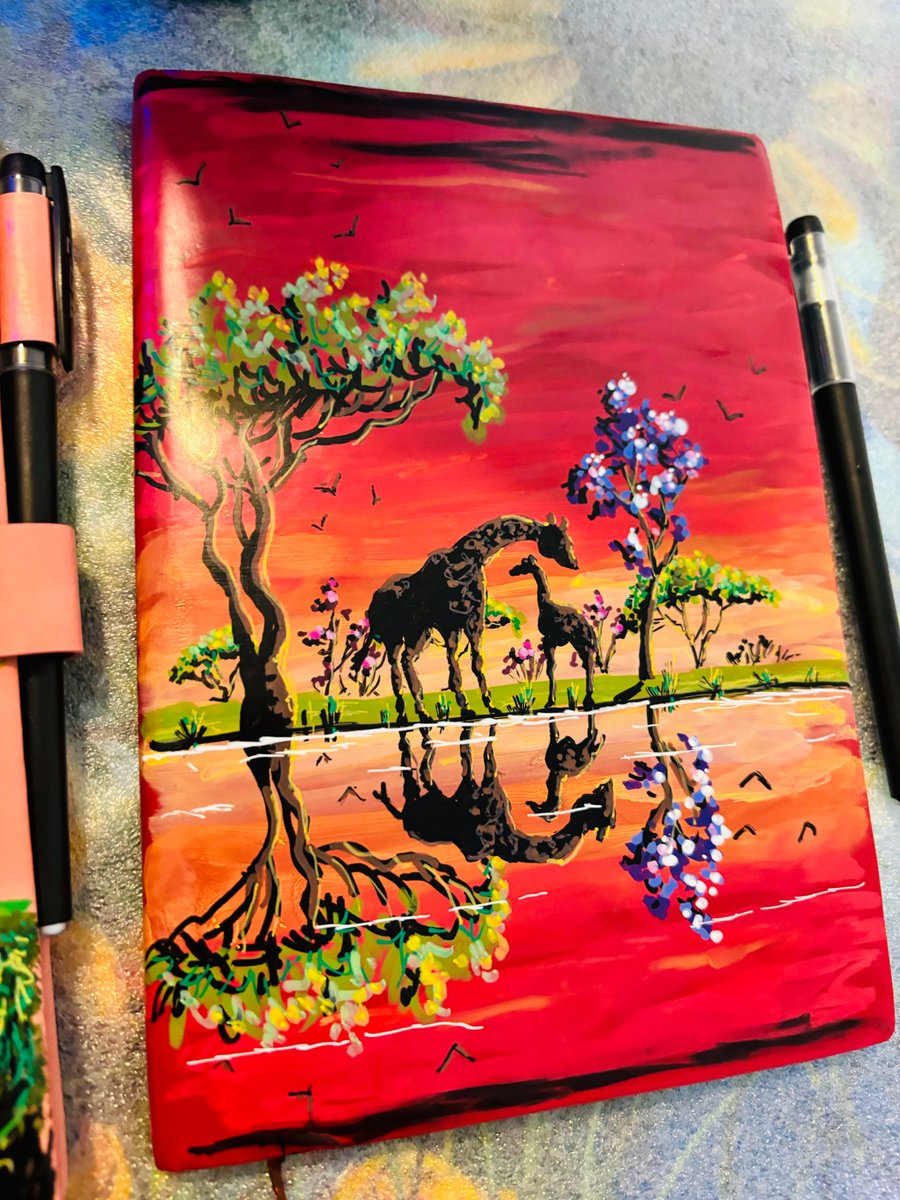 A hand painted and sealed faux leather journal by Andrew Jenkins 