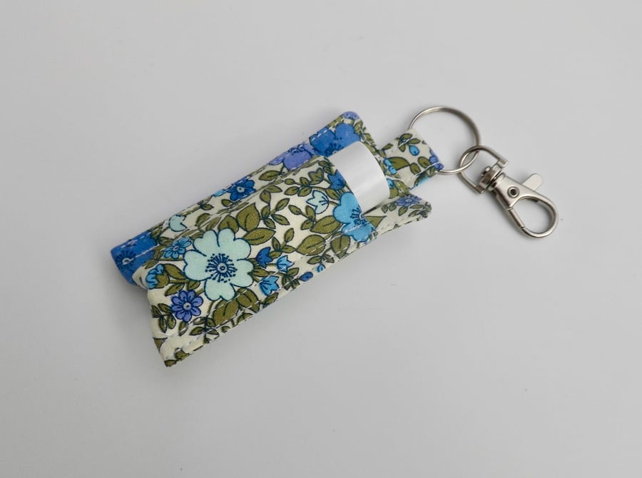 Key ring lip balm holder in blue and green floral fabric keyring 