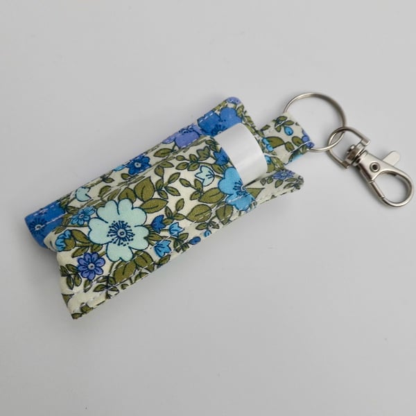 Key ring lip balm holder in blue and green floral fabric keyring 
