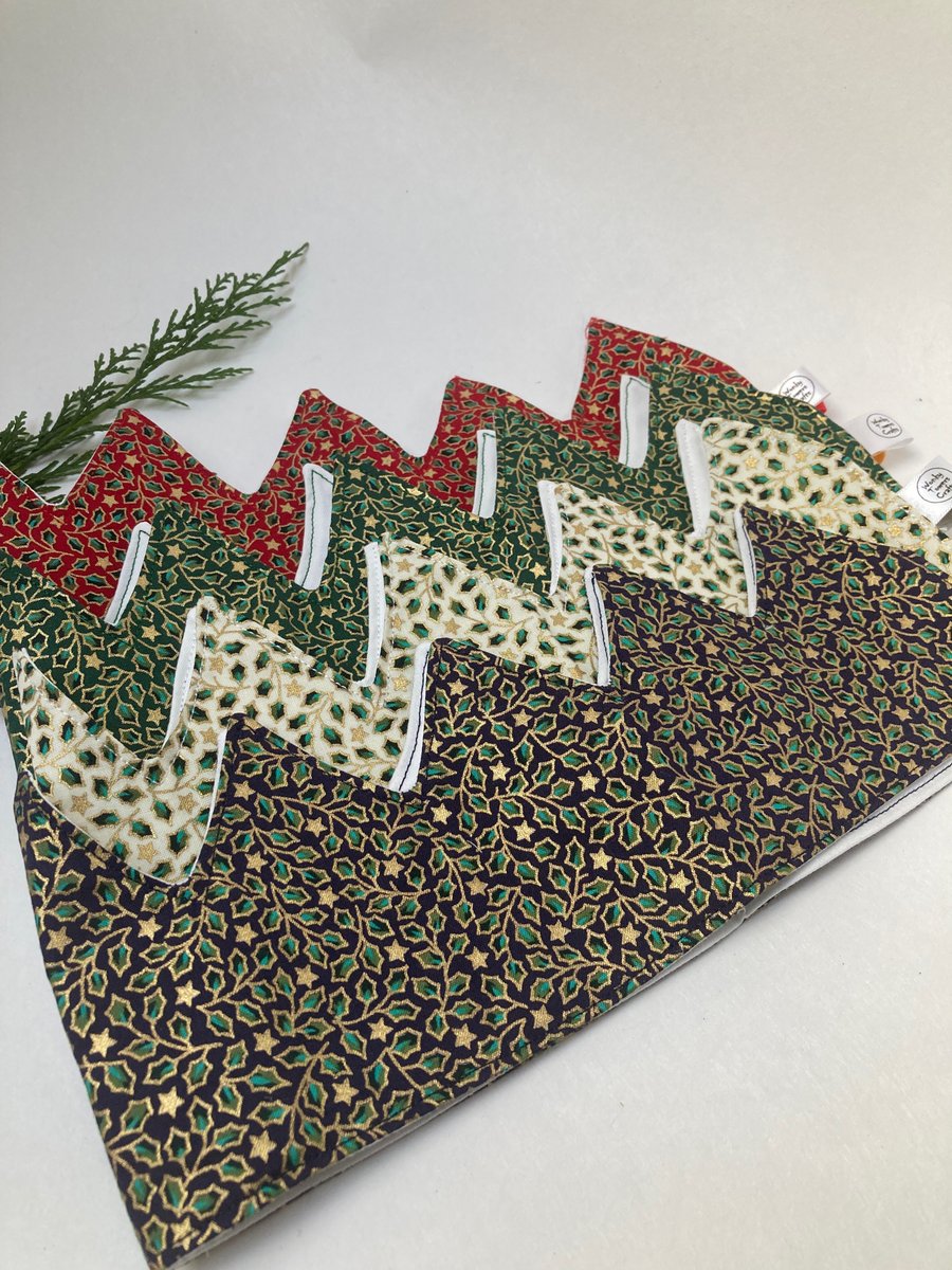 Set of four reusable Christmas crown party hats. Holly fabric