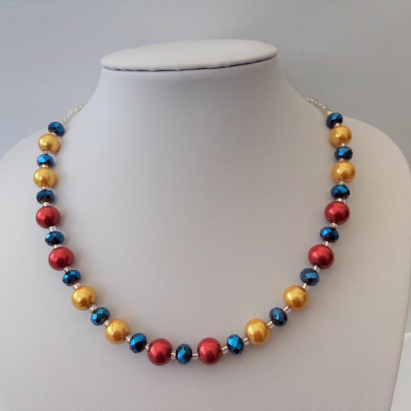 Bright coloured pearl and crystal necklace, red, gold, blue, silver.