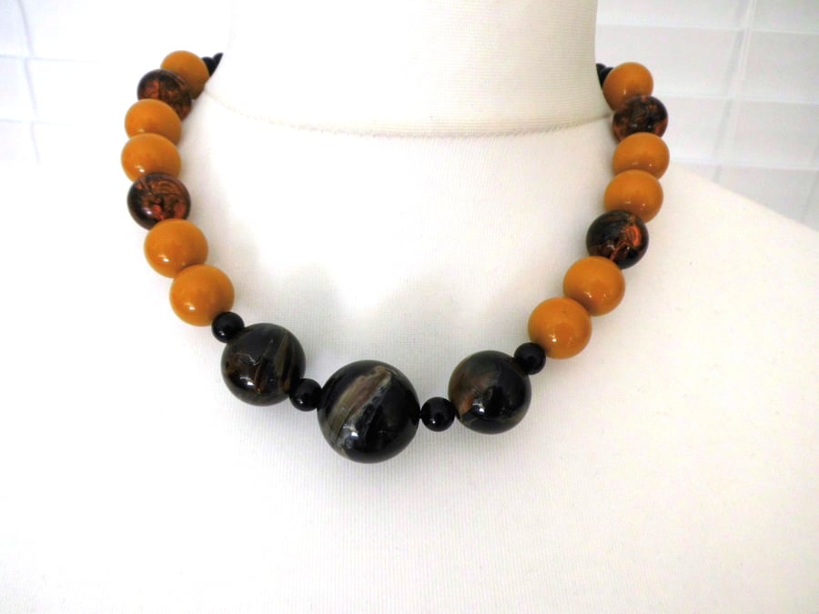 Upcycled black, orange and amber large bead necklace