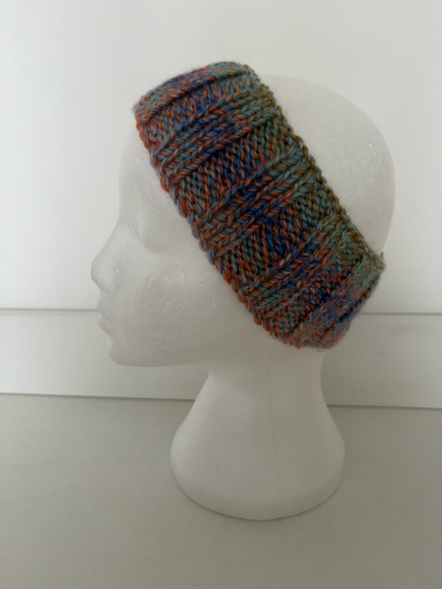 Hand knitted headband. 