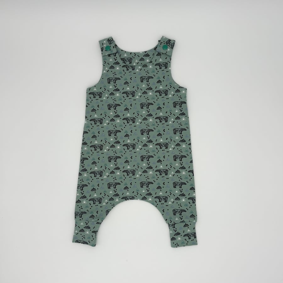 Geometric bears on green handmade baby romper