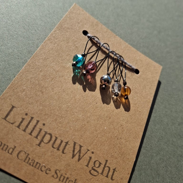 Five recycled jewellery stitch markers