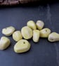 10 Small Yellow Glazed Nugget Pebble Clay Beads - Image 1