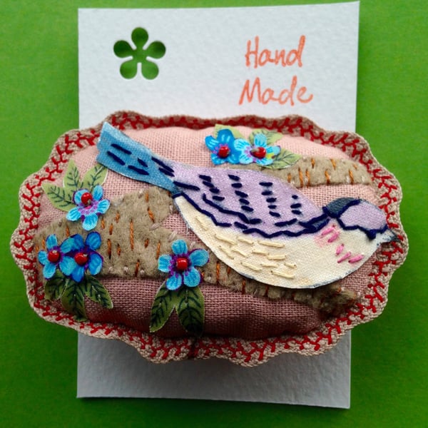 Bird on a branch brooch