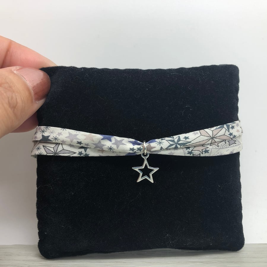 Ribbon bracelet, sterling silver star charm. Liberty of London ribbon.