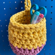 Small crochet hanging basket, pegboard basket - pink and yellow