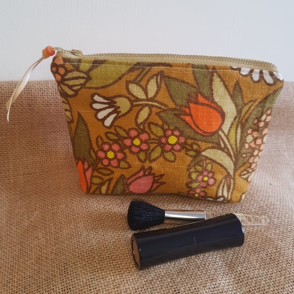 Vintage fabric  zipped pouch or makeup bag: orange tones