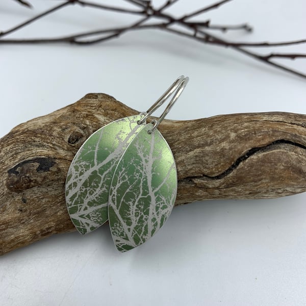 Green aluminium drop earrings with tree design