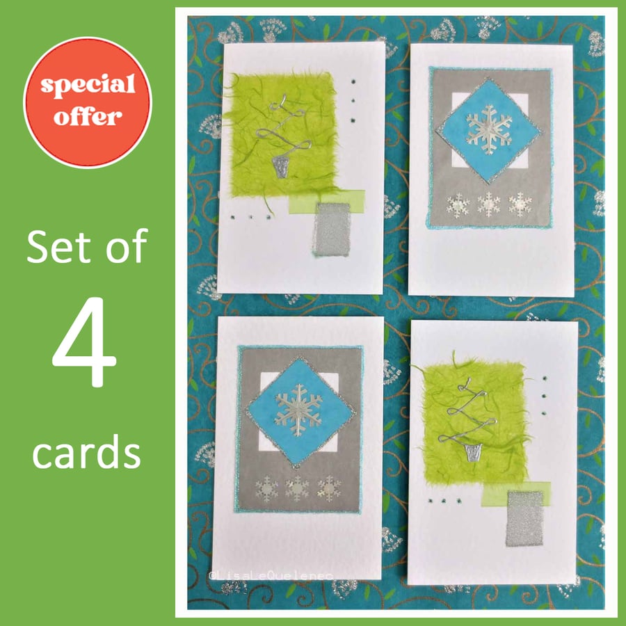 Four pack of modern christmas cards snowflakes and trees (g)