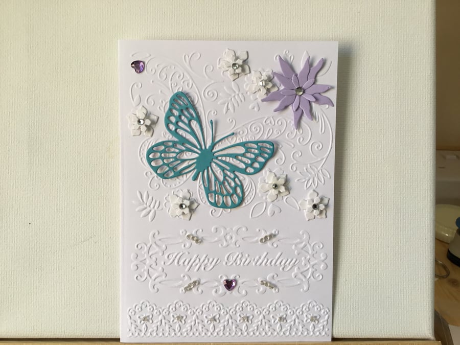 Pretty embossed flower and butterfly Birthday card. CC405